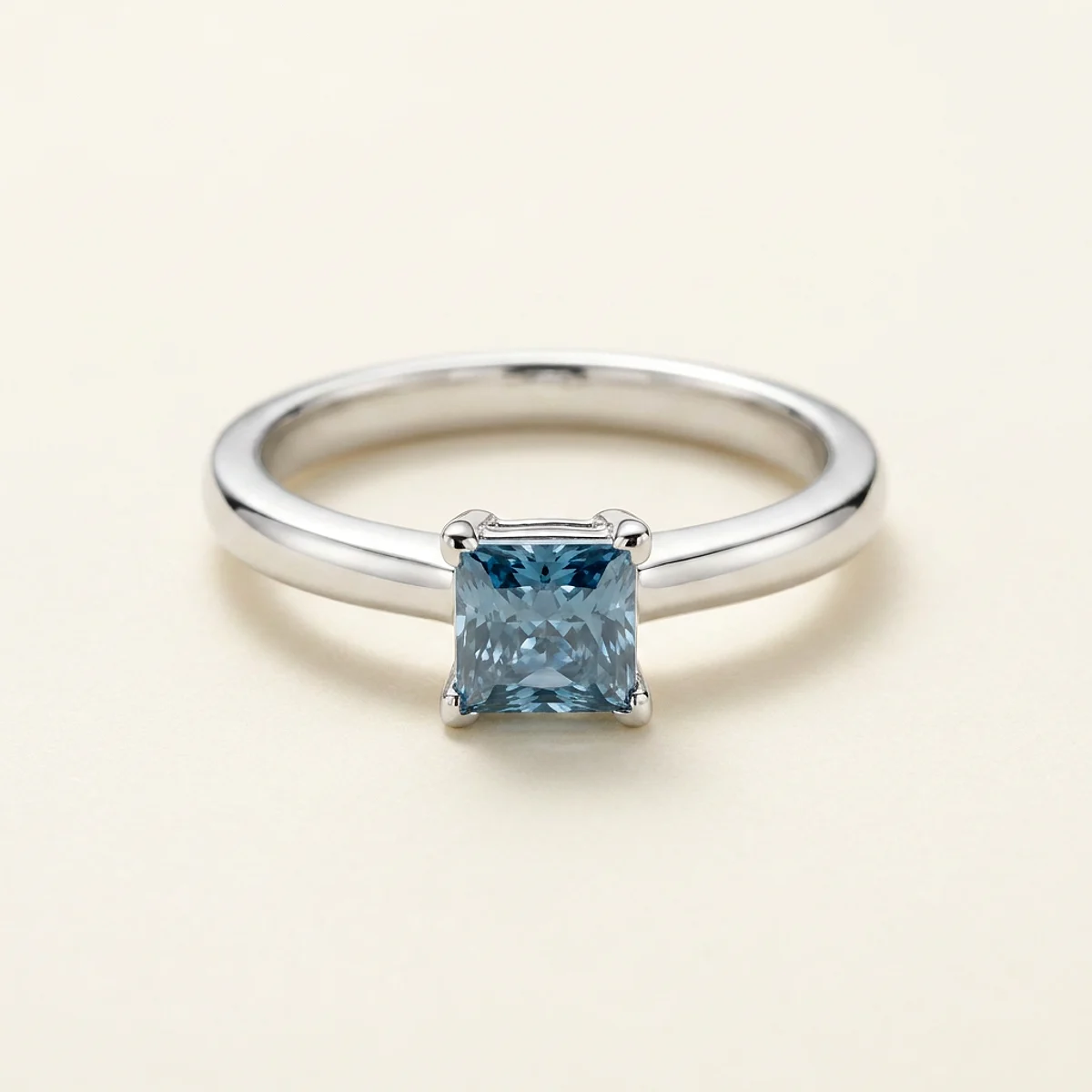 A .5ct blue square radiant diamond on a white gold ring, custom-designed by Eterneva to honor the remarkable Christopher.
