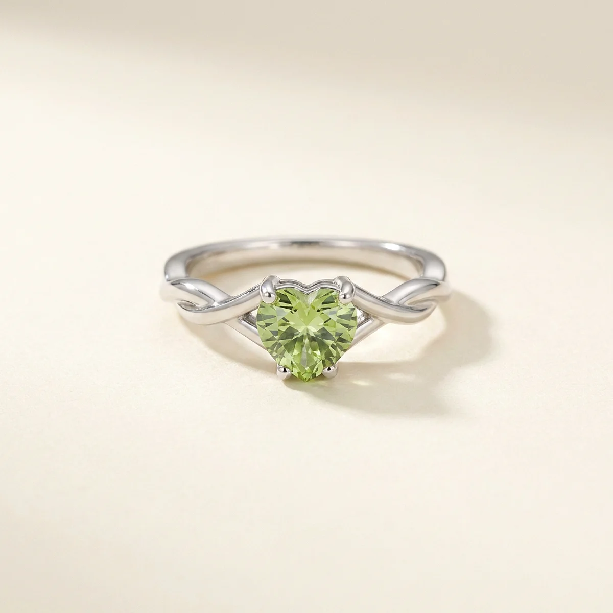 A .75ct green heart diamond on a white gold ring, custom-designed by Eterneva to honor the remarkable Adrien.