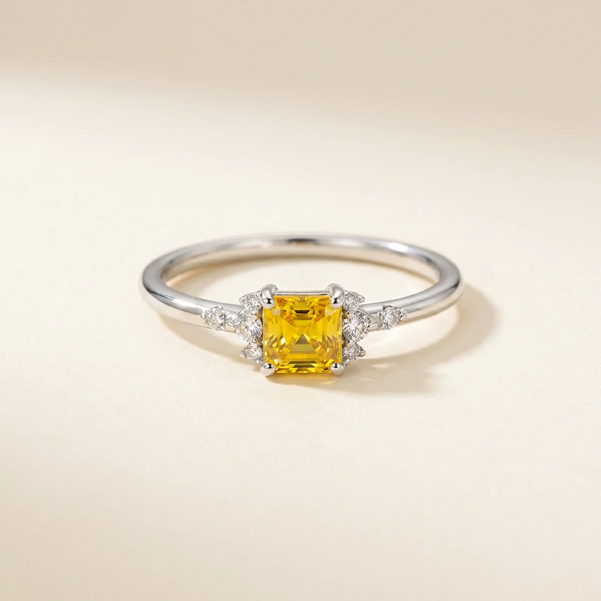 A .5ct yellow asscher diamond on a white gold ring, custom-designed by Eterneva to honor the remarkable Aiden.