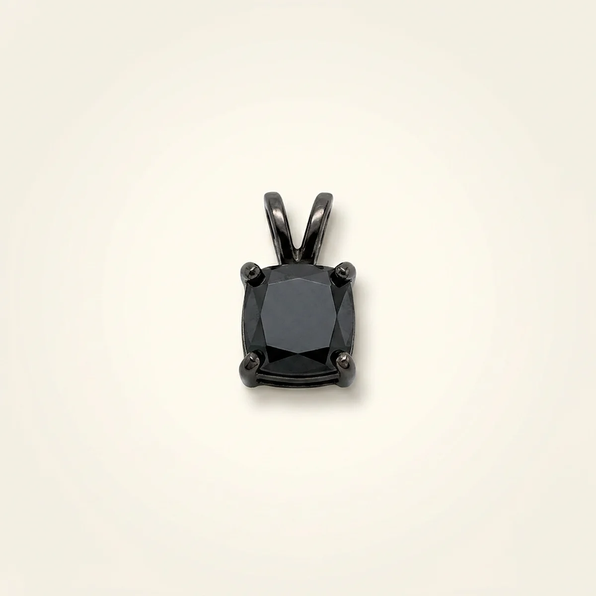 A .4ct black cushion diamond on a white gold pendant, custom-designed by Eterneva to honor the remarkable Evangelina.