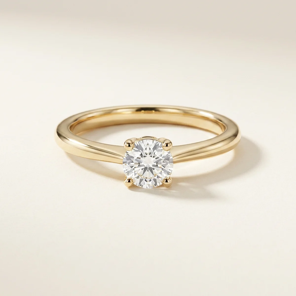 A .25ct colorless round diamond on a yellow gold ring, custom-designed by Eterneva to honor the remarkable Joni.