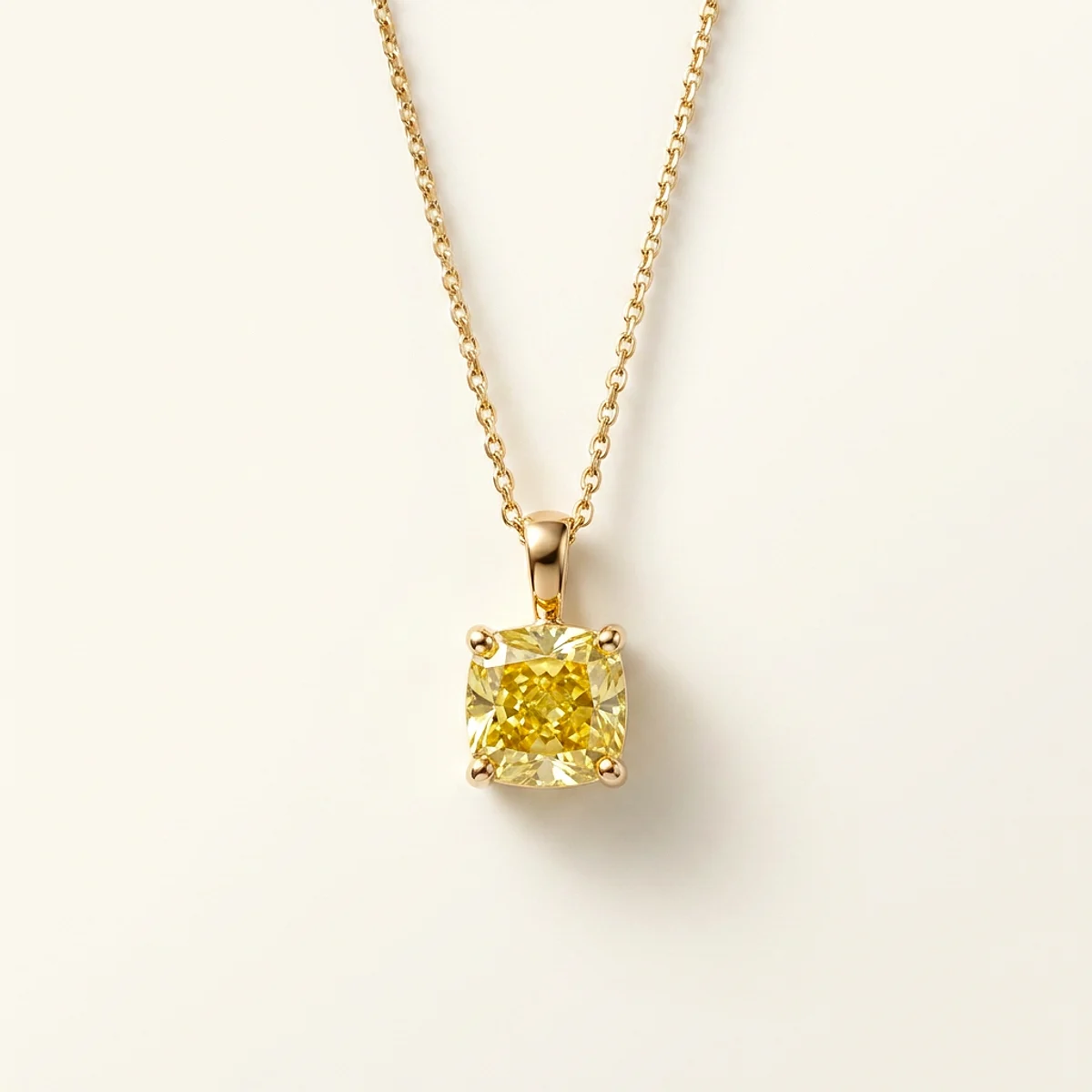 A 1.5ct yellow cushion diamond on a yellow gold pendant, custom-designed by Eterneva to honor the remarkable Abby.