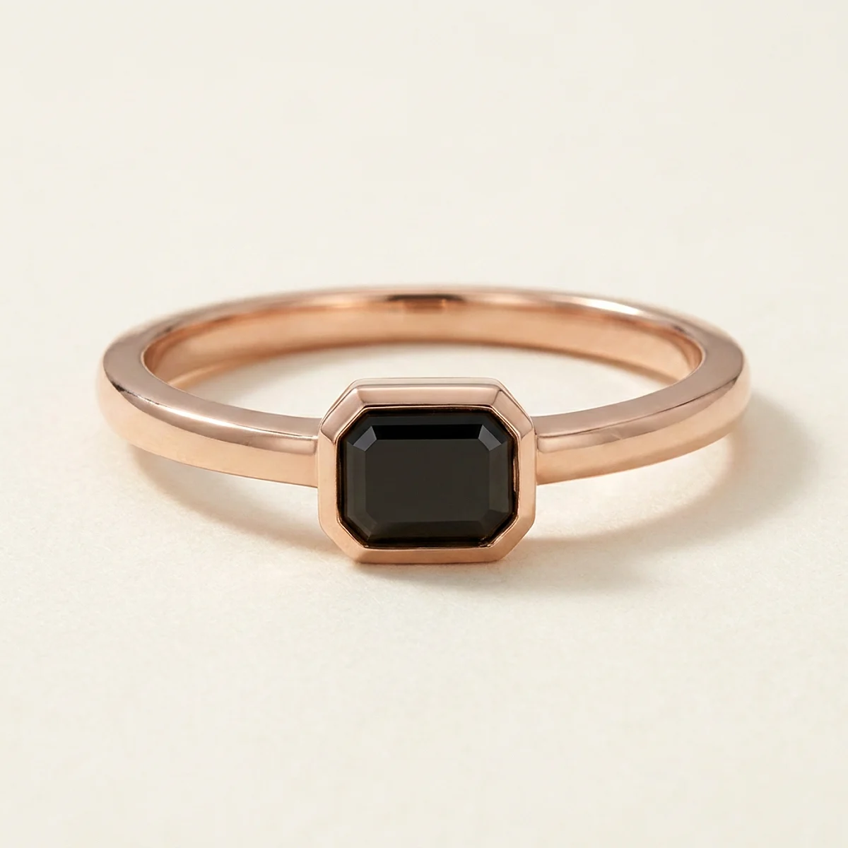 A .25ct black emerald diamond on a rose gold ring, custom-designed by Eterneva to honor the remarkable Childhood.