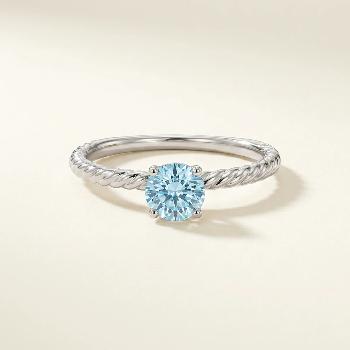 A .5ct blue round diamond on a white gold ring, custom-designed by Eterneva to honor the remarkable Janie.