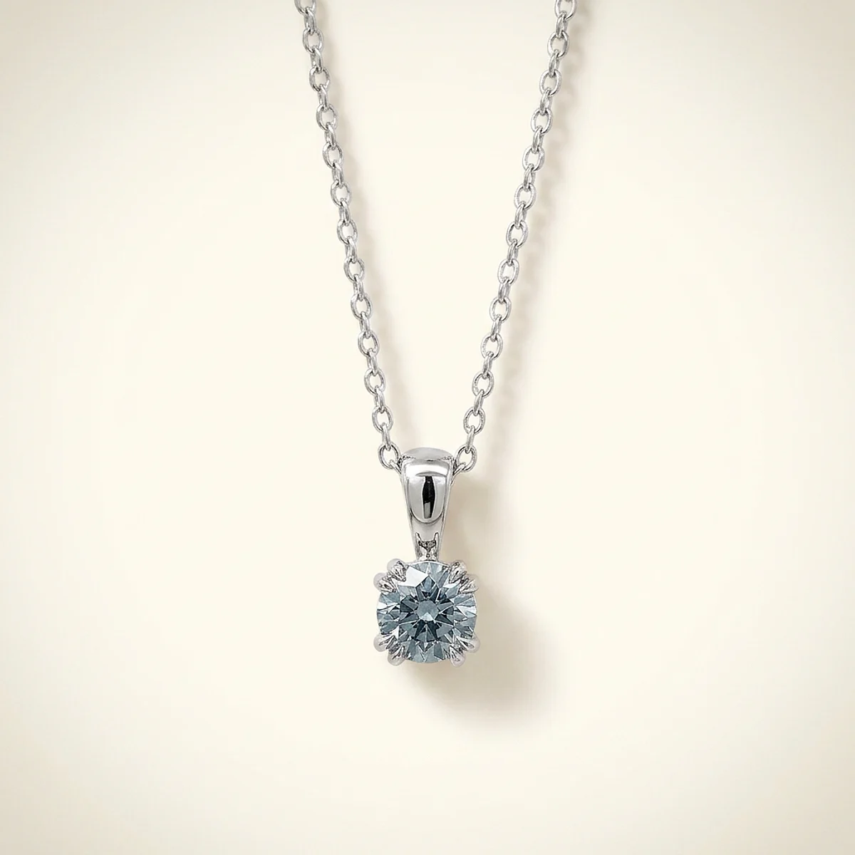 A .4ct blue round diamond on a white gold pendant, custom-designed by Eterneva to honor the remarkable Thomas.