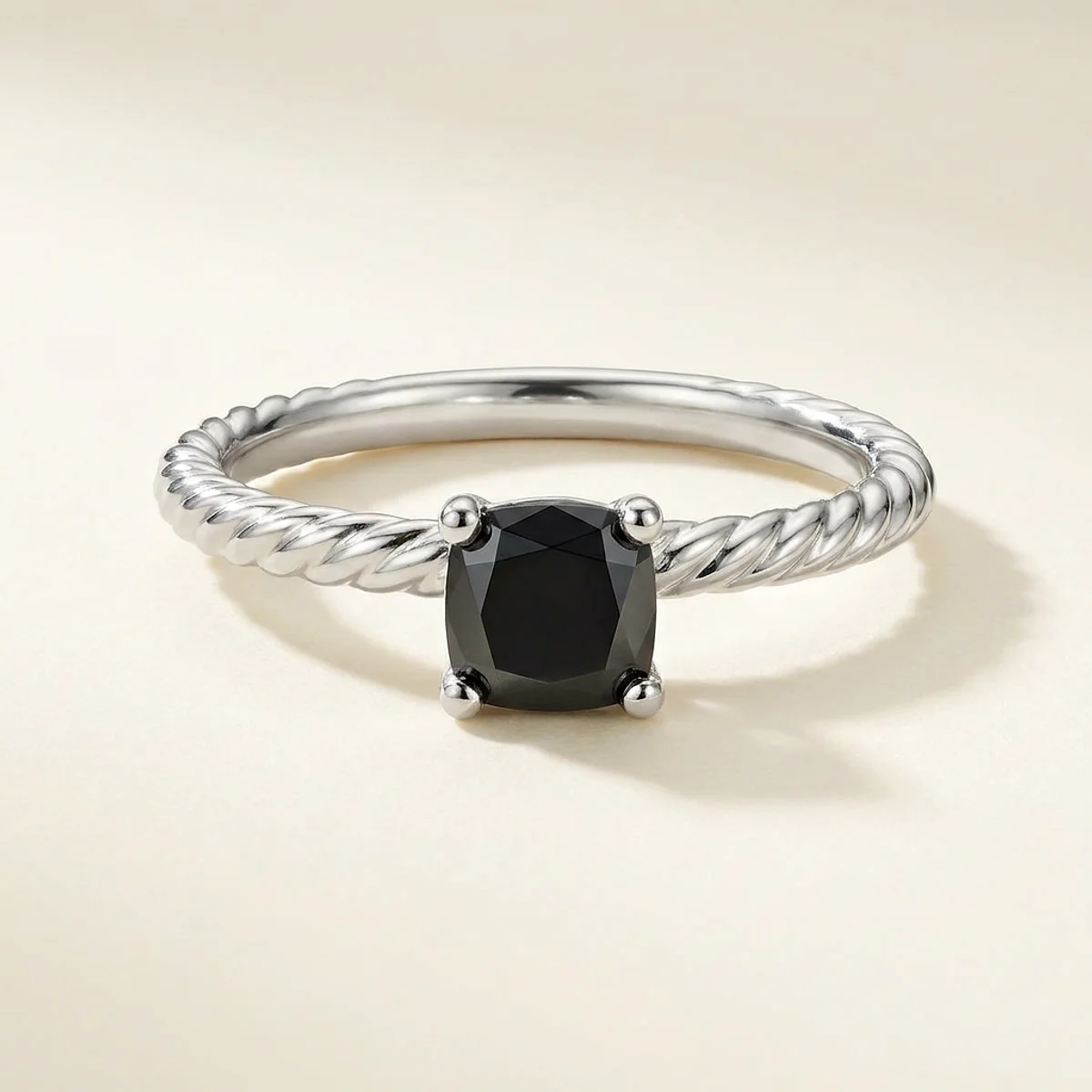 A .75ct black cushion diamond on a platinum ring, custom-designed by Eterneva to honor the remarkable Charlie.