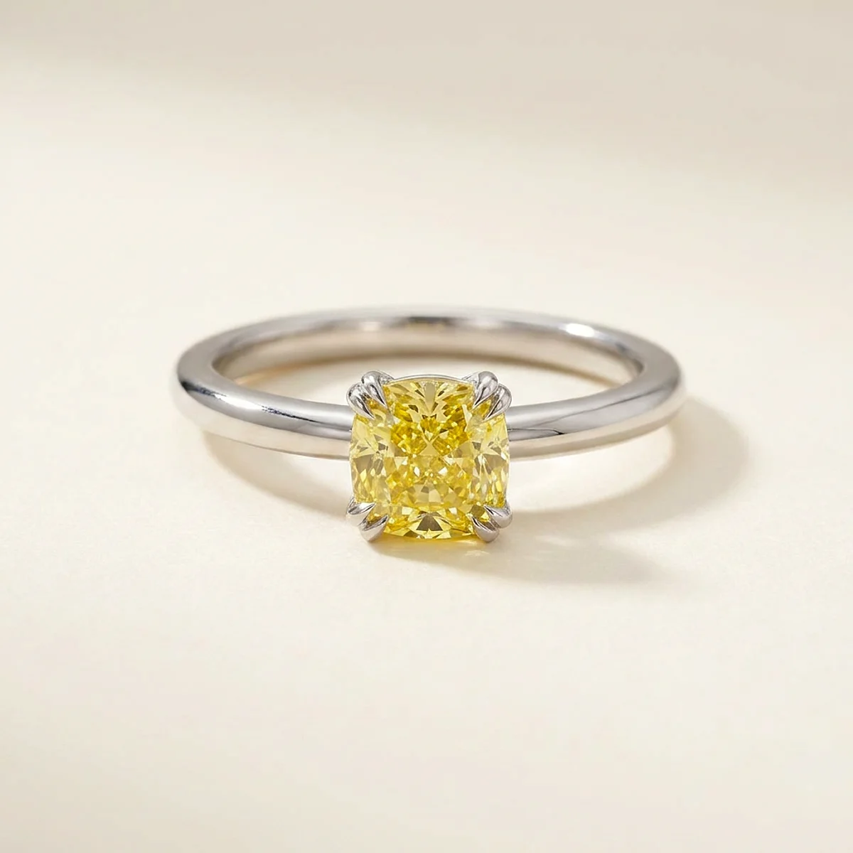 A .75ct yellow cushion diamond on a white gold ring, custom-designed by Eterneva to honor the remarkable Matthew.