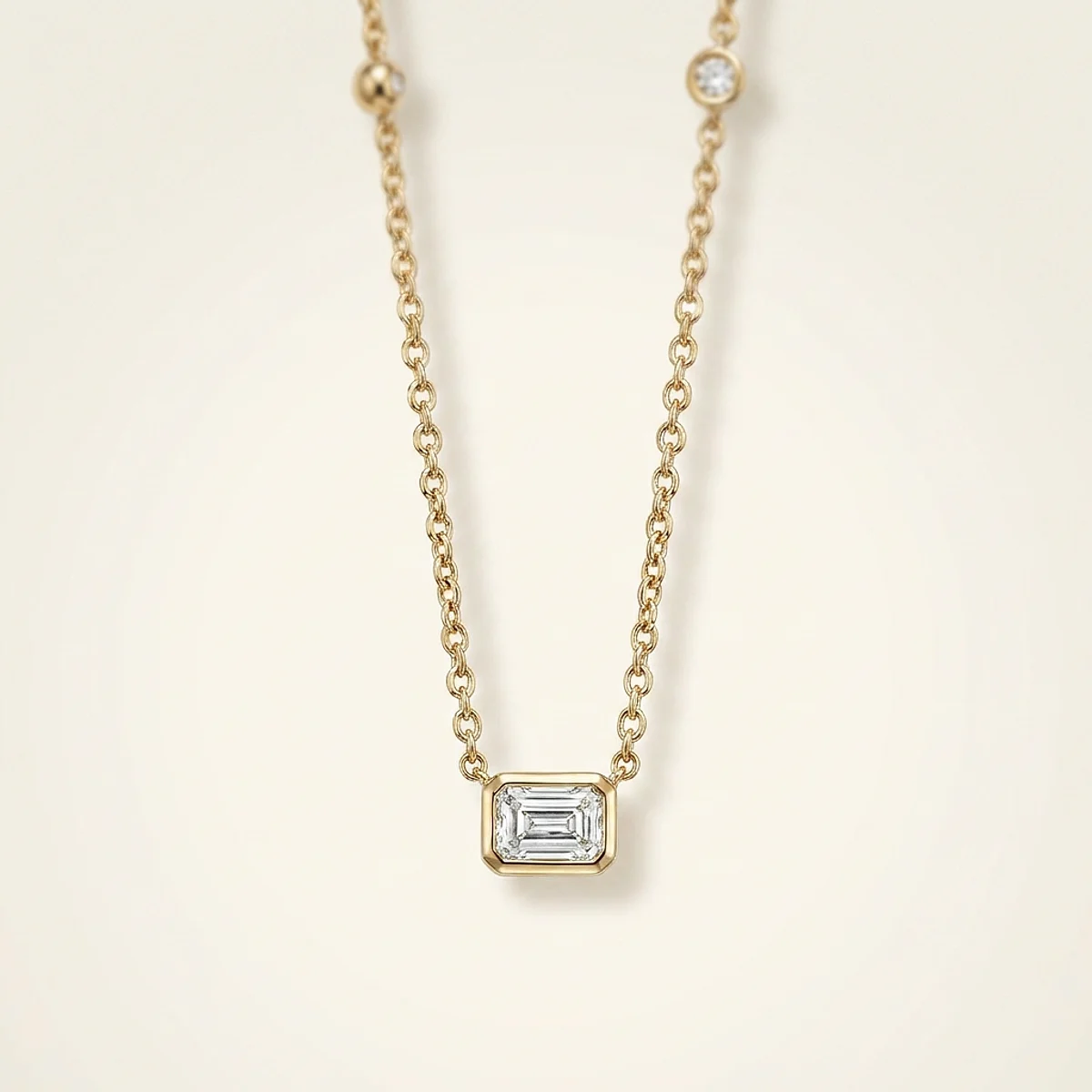 A .5ct colorless rectangular radiant diamond on a yellow gold necklace, custom-designed by Eterneva to honor the remarkable Bärbel.