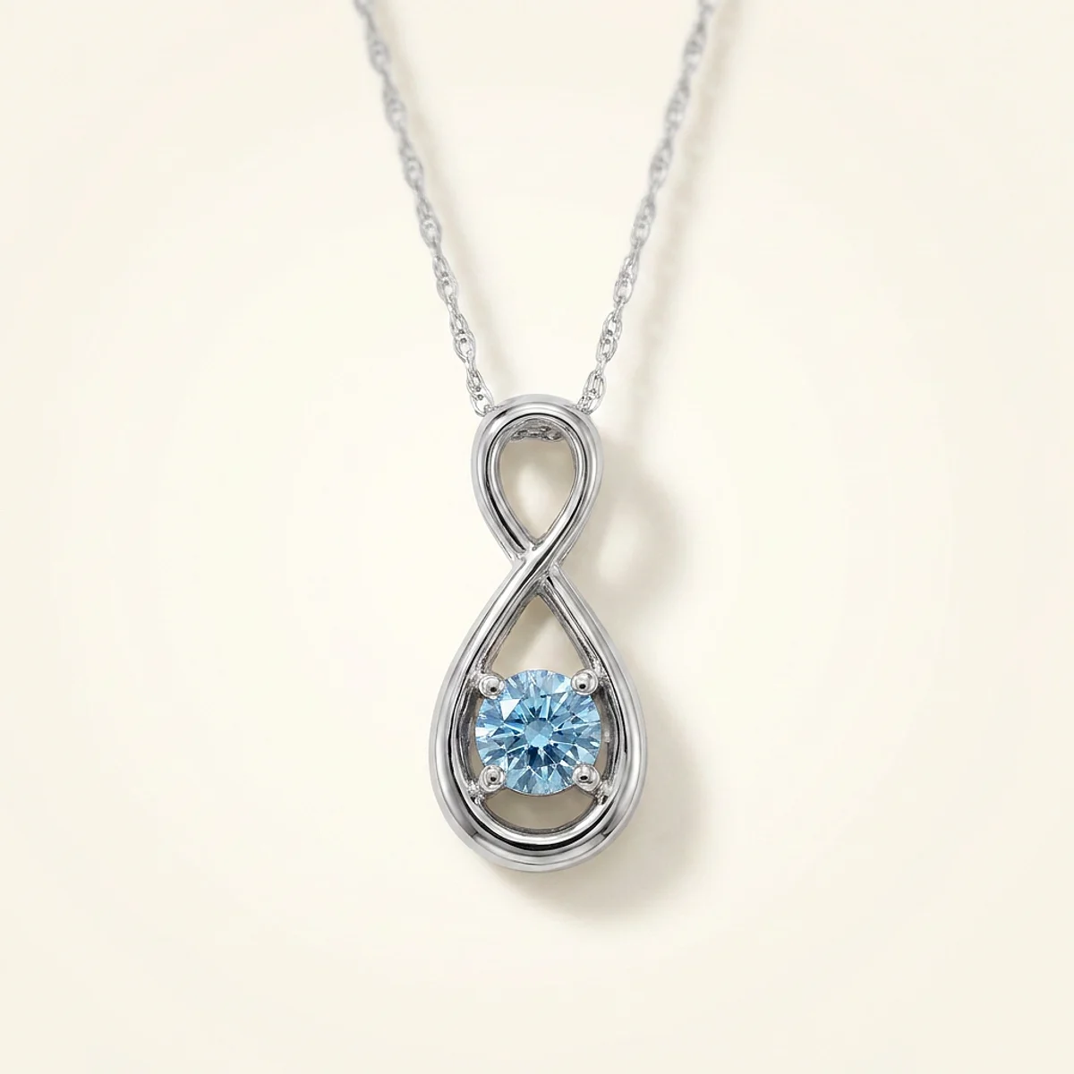 A .5ct blue round diamond on a platinum pendant, custom-designed by Eterneva to honor the remarkable Joyce.