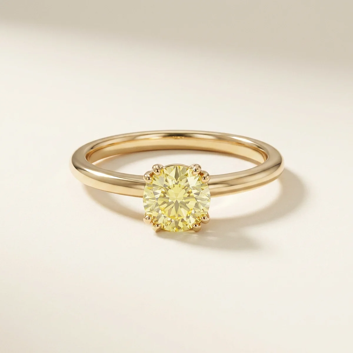A .5ct yellow round diamond on a yellow gold ring, custom-designed by Eterneva to honor the remarkable Wendel.