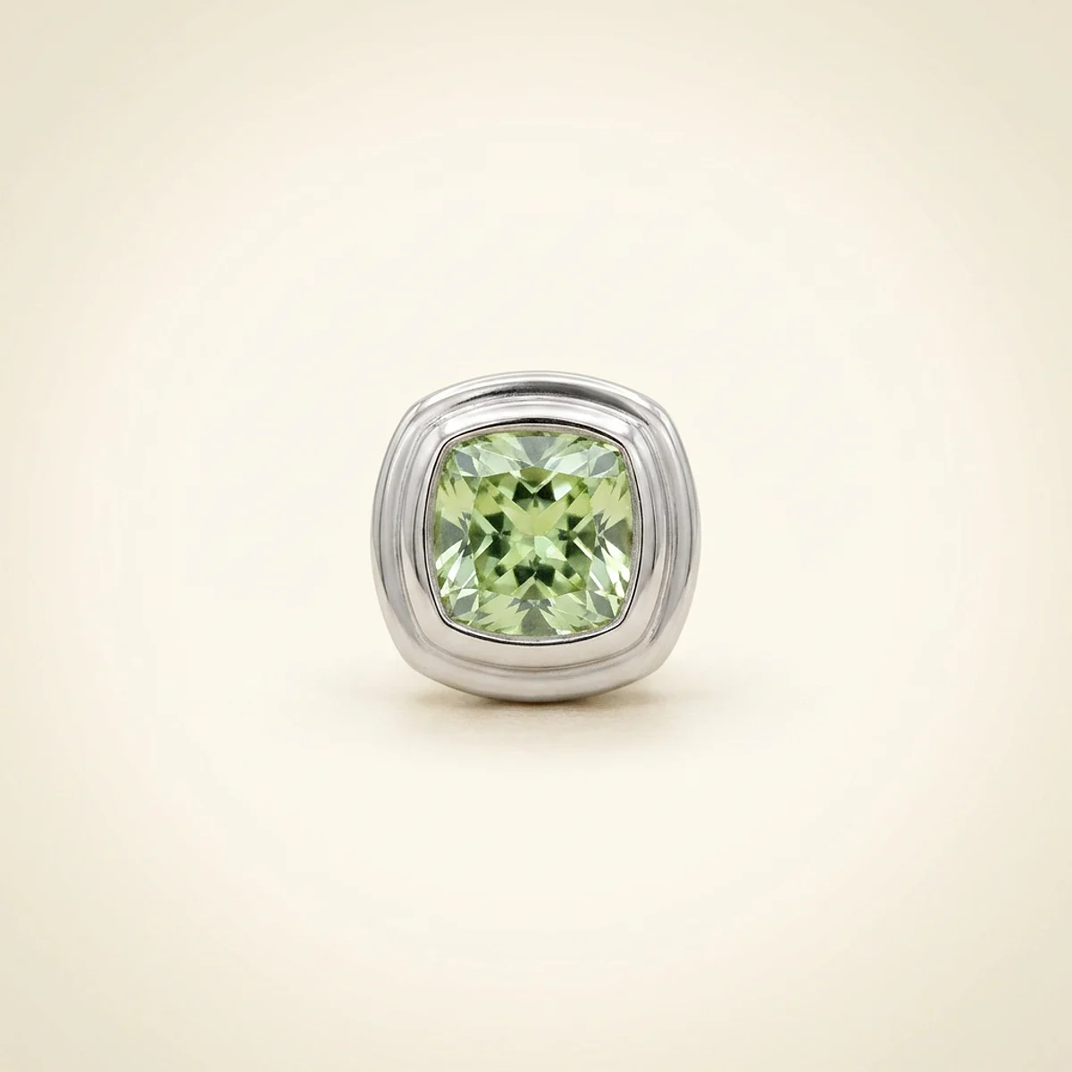A .4ct green cushion diamond on a white gold pendant, custom-designed by Eterneva to honor the remarkable Charlie.