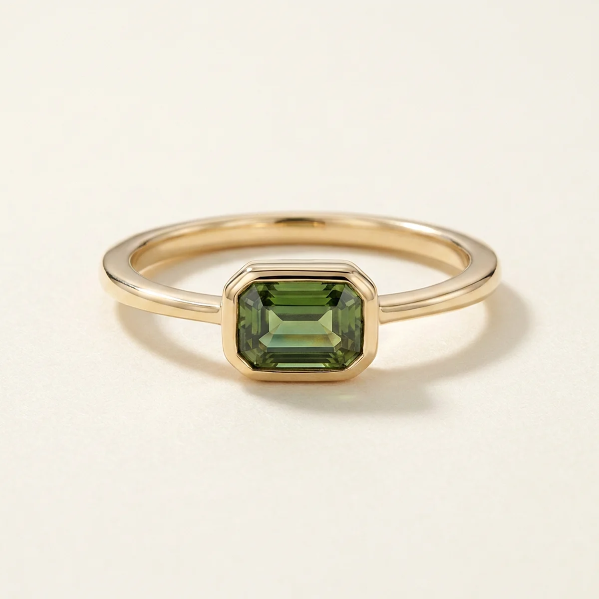 A .5ct green emerald diamond on a yellow gold ring, custom-designed by Eterneva to honor the remarkable Robin.