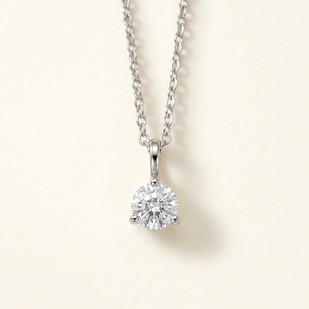 A .5ct colorless round diamond on a white gold pendant, custom-designed by Eterneva to honor the remarkable Patti.