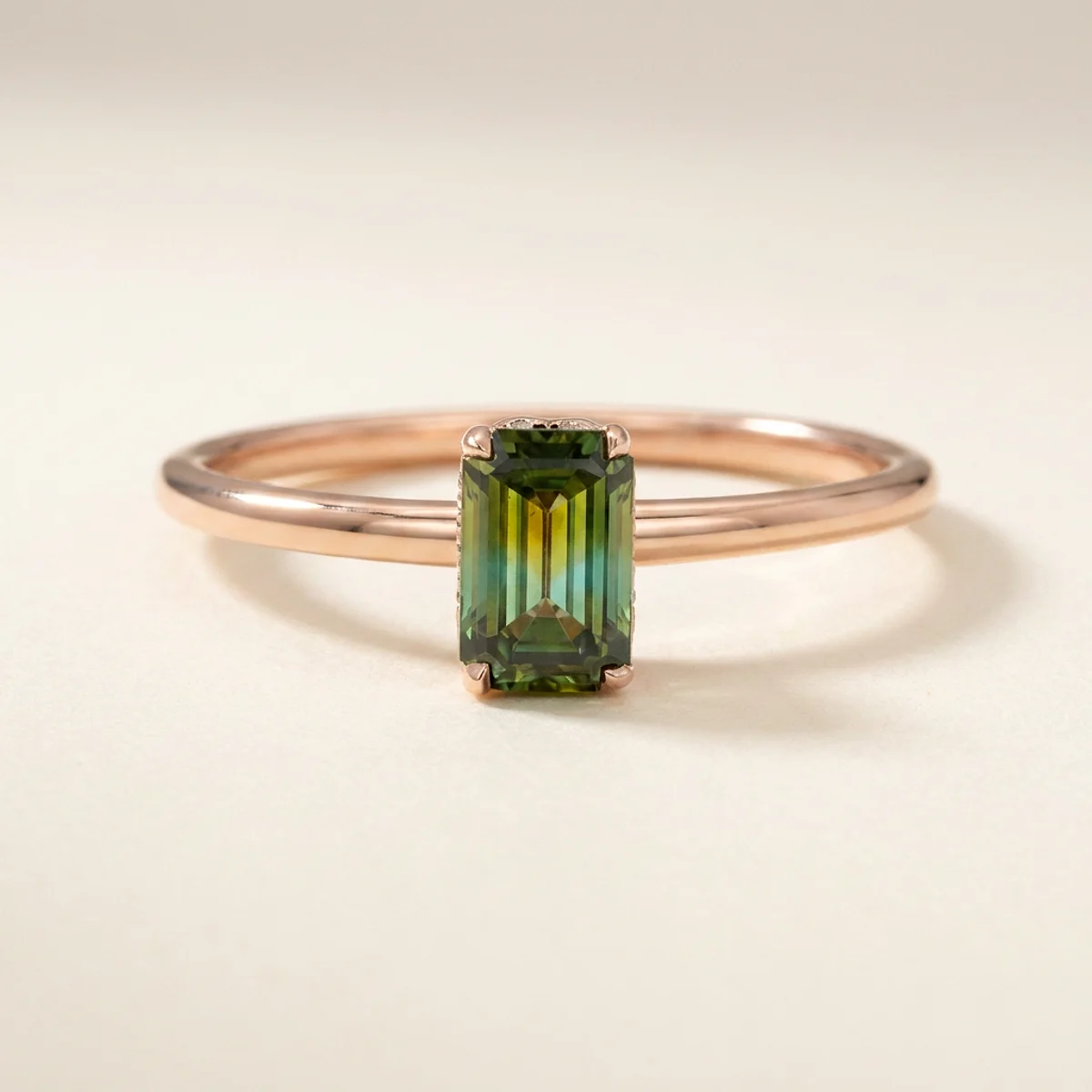 A .75ct green emerald diamond on a rose gold ring, custom-designed by Eterneva to honor the remarkable Abby.