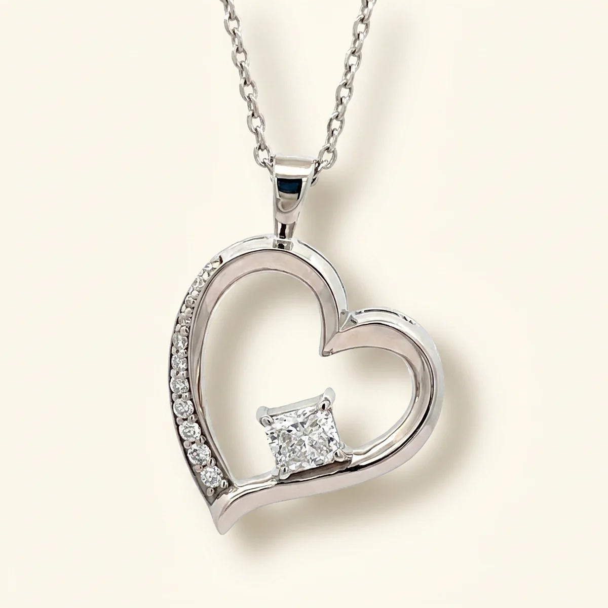 A .4ct colorless rectangular radiant diamond on a white gold pendant, custom-designed by Eterneva to honor the remarkable Daniel.