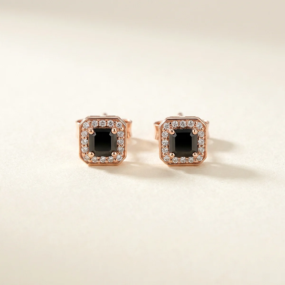 A .5ct black asscher diamond on rose gold earrings, custom-designed by Eterneva to honor the remarkable Devin.