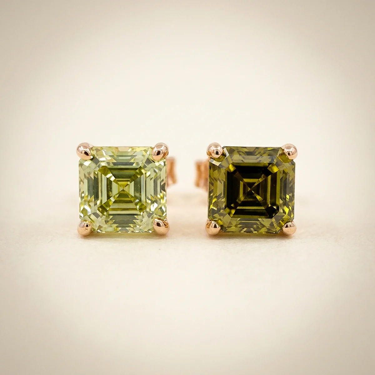 A .5ct green asscher diamond on yellow gold earrings, custom-designed by Eterneva to honor the remarkable Warren.