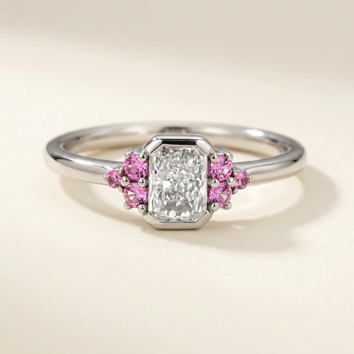 A .5ct colorless rectangular radiant diamond on a white gold ring, custom-designed by Eterneva to honor the remarkable Buckle.