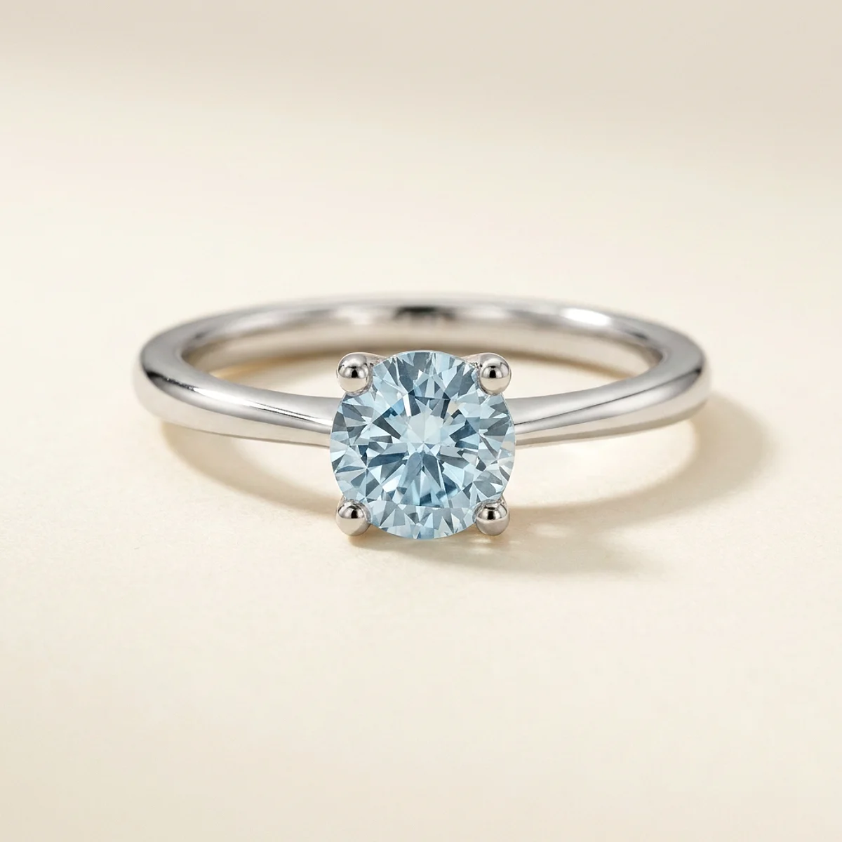 A .75ct blue round diamond on a white gold ring, custom-designed by Eterneva to honor the remarkable Ralphie.