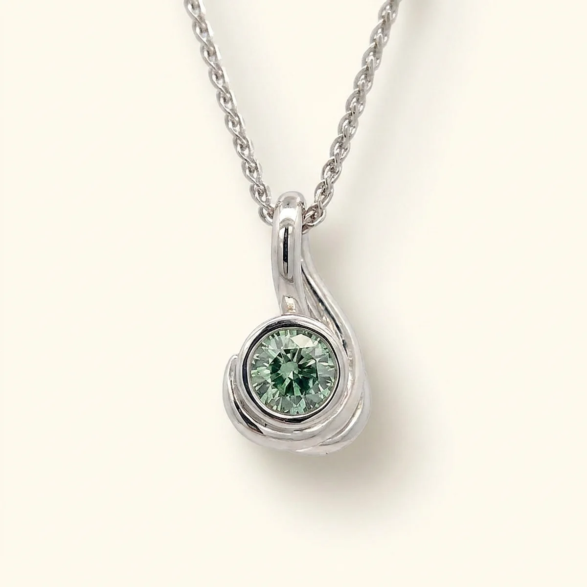 A .25ct green round diamond on a white gold pendant, custom-designed by Eterneva to honor the remarkable Derek.