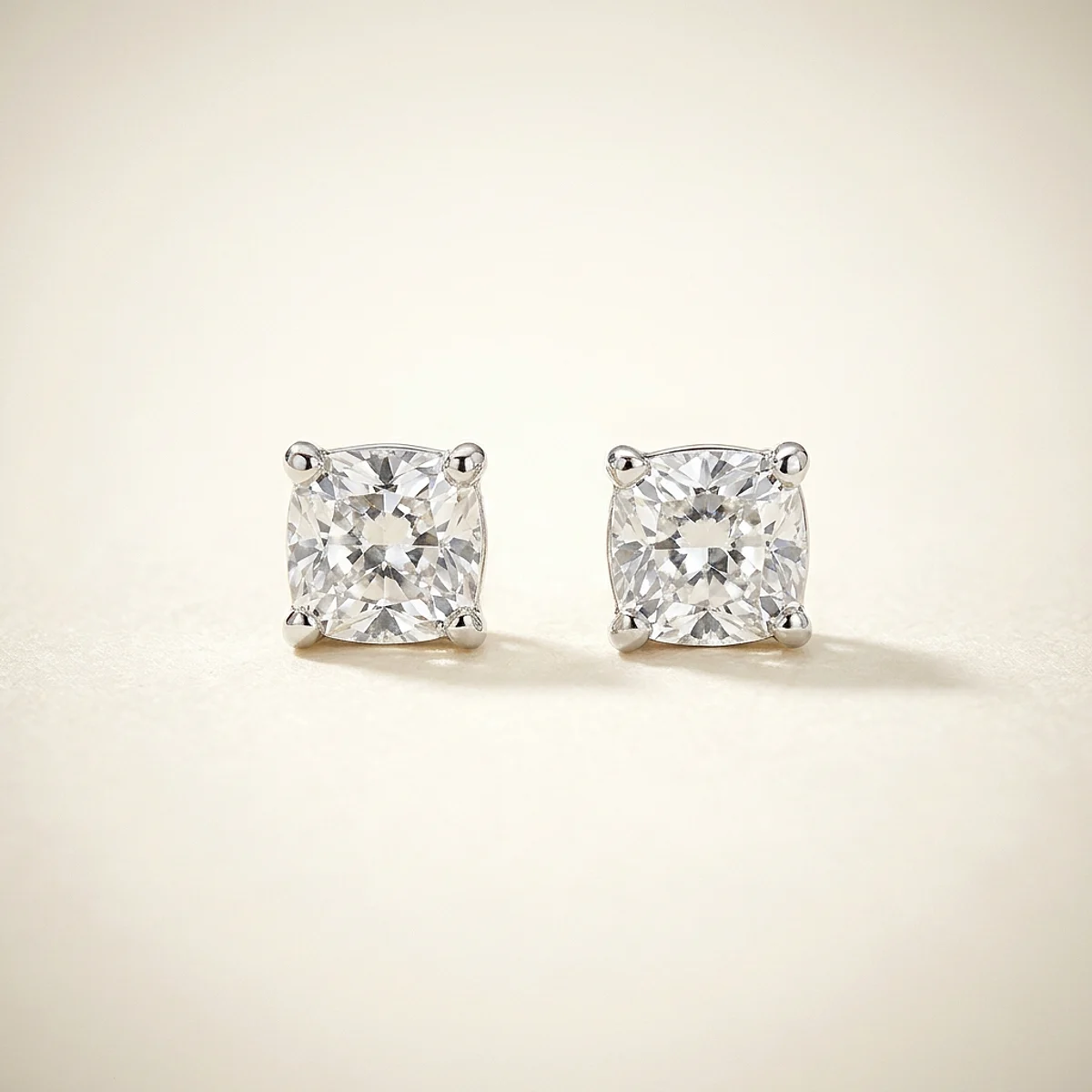 A .25ct colorless cushion diamond on white gold earrings, custom-designed by Eterneva to honor the remarkable Tristan.