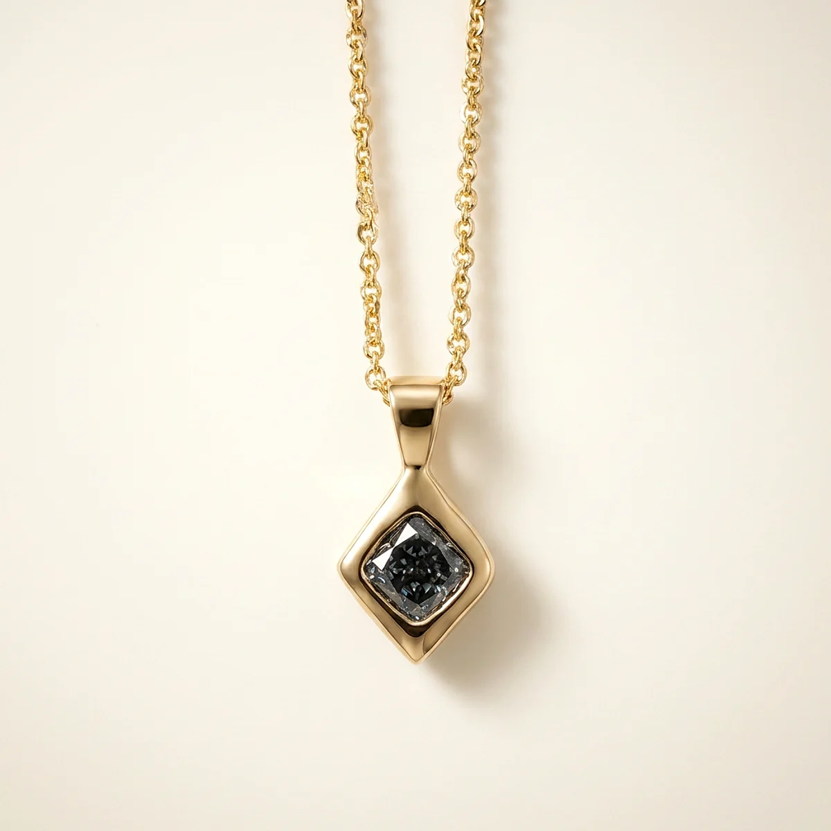 A .5ct blue cushion diamond on a yellow gold pendant, custom-designed by Eterneva to honor the remarkable Jackie.