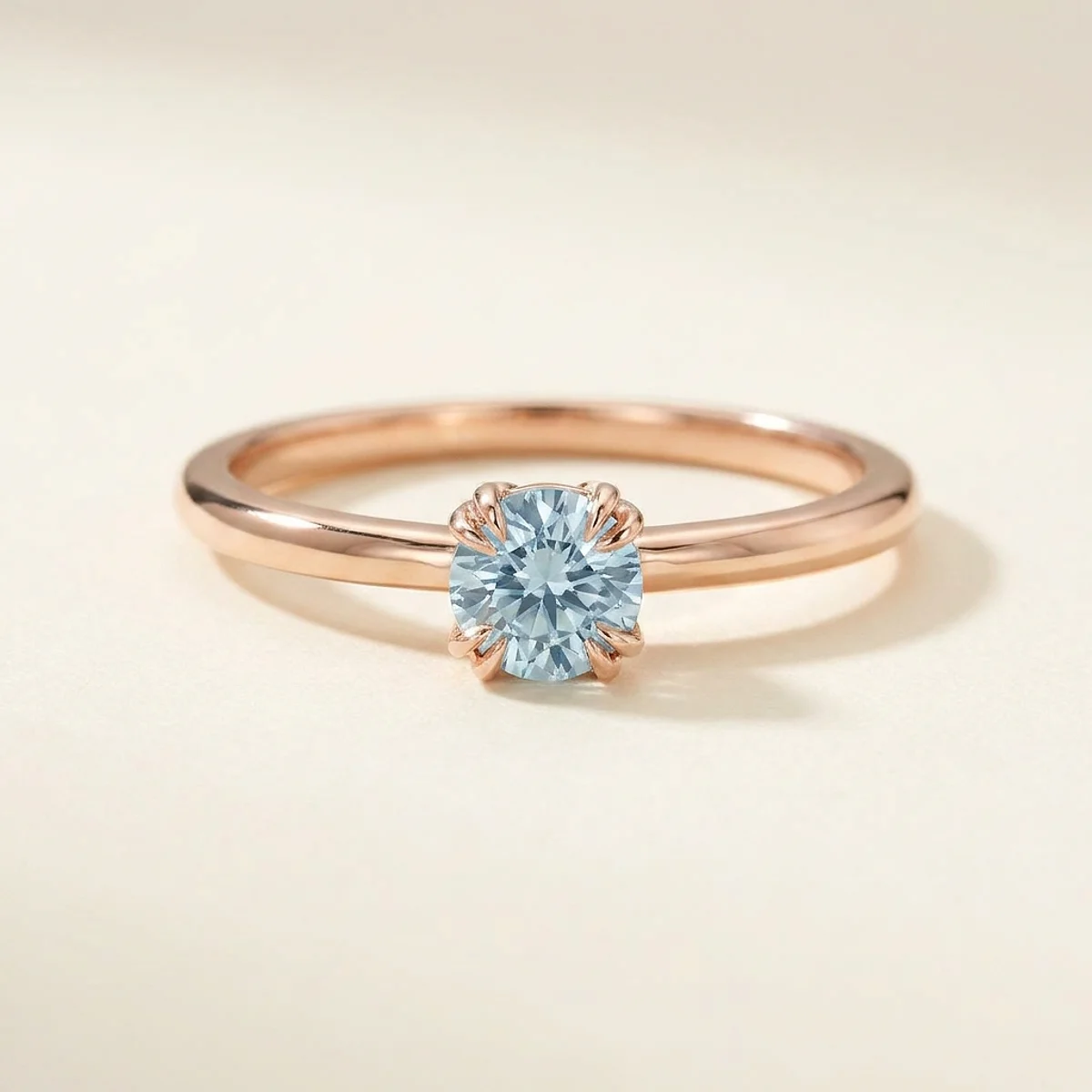 A .5ct blue round diamond on a rose gold ring, custom-designed by Eterneva to honor the remarkable Grizzly.