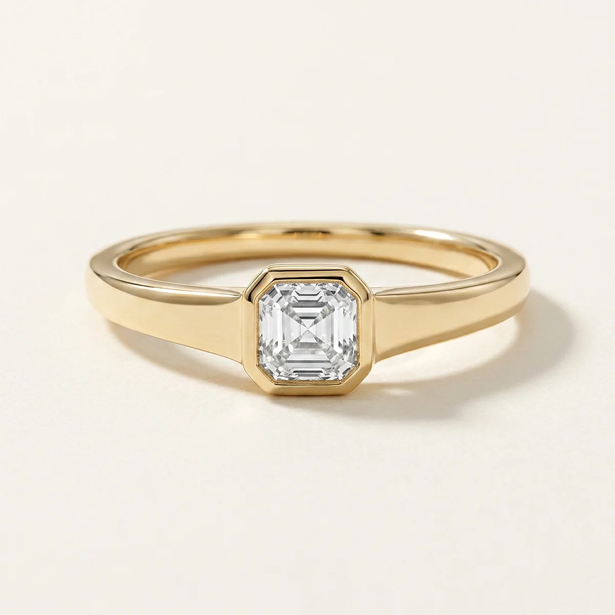 A .5ct colorless asscher diamond on a yellow gold ring, custom-designed by Eterneva to honor the remarkable Myrna.