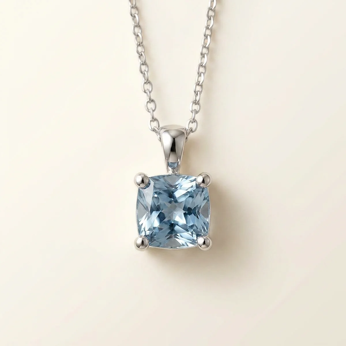 A 2ct blue cushion diamond on a white gold pendant, custom-designed by Eterneva to honor the remarkable Derrick.