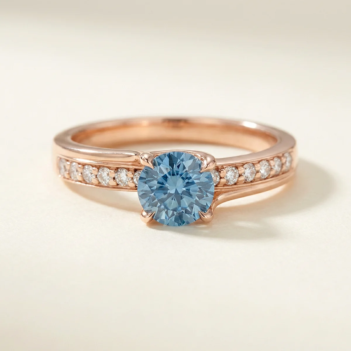 A .5ct blue round diamond on a rose gold ring, custom-designed by Eterneva to honor the remarkable Justin.