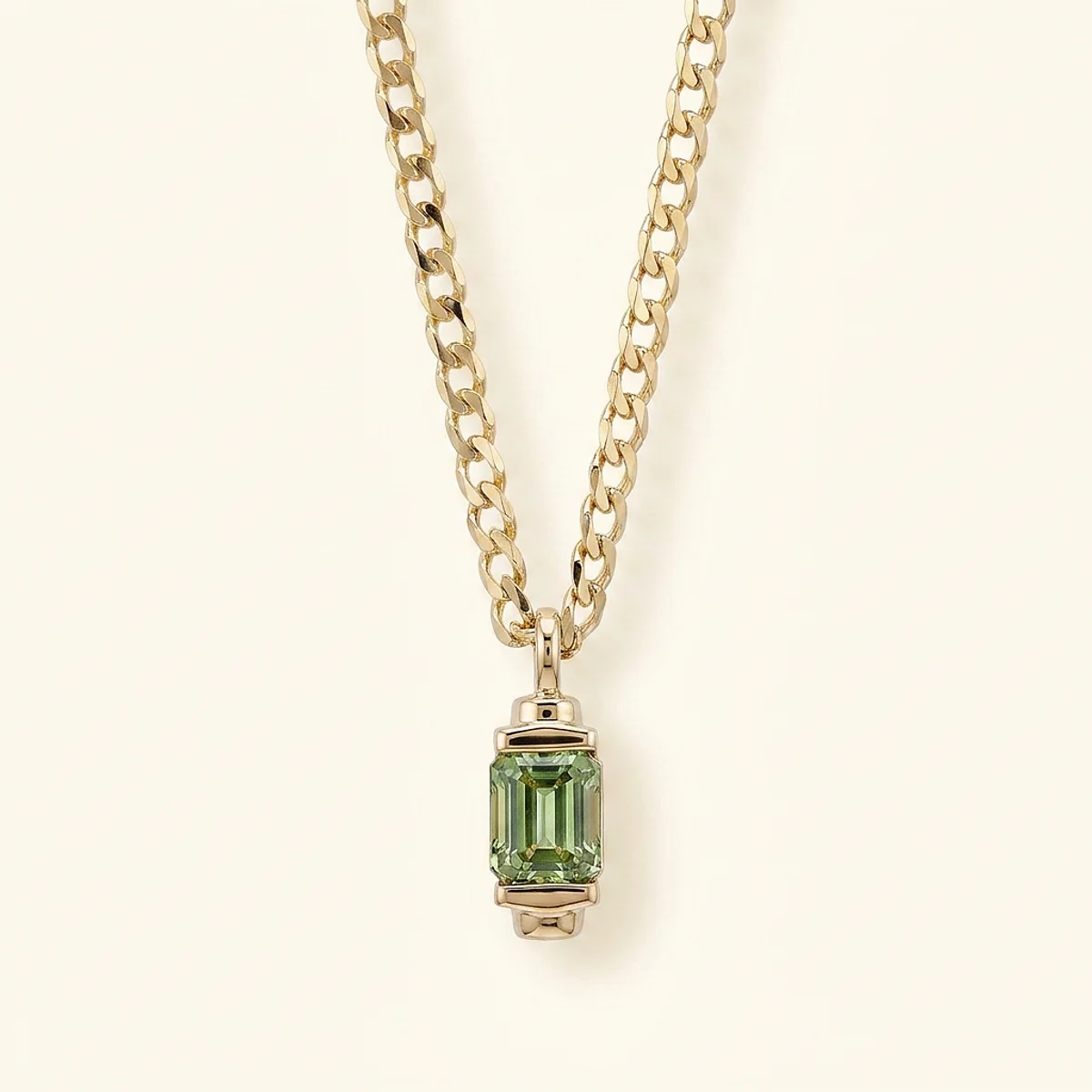 A .25ct green emerald diamond on a yellow gold necklace, custom-designed by Eterneva to honor the remarkable Hank.