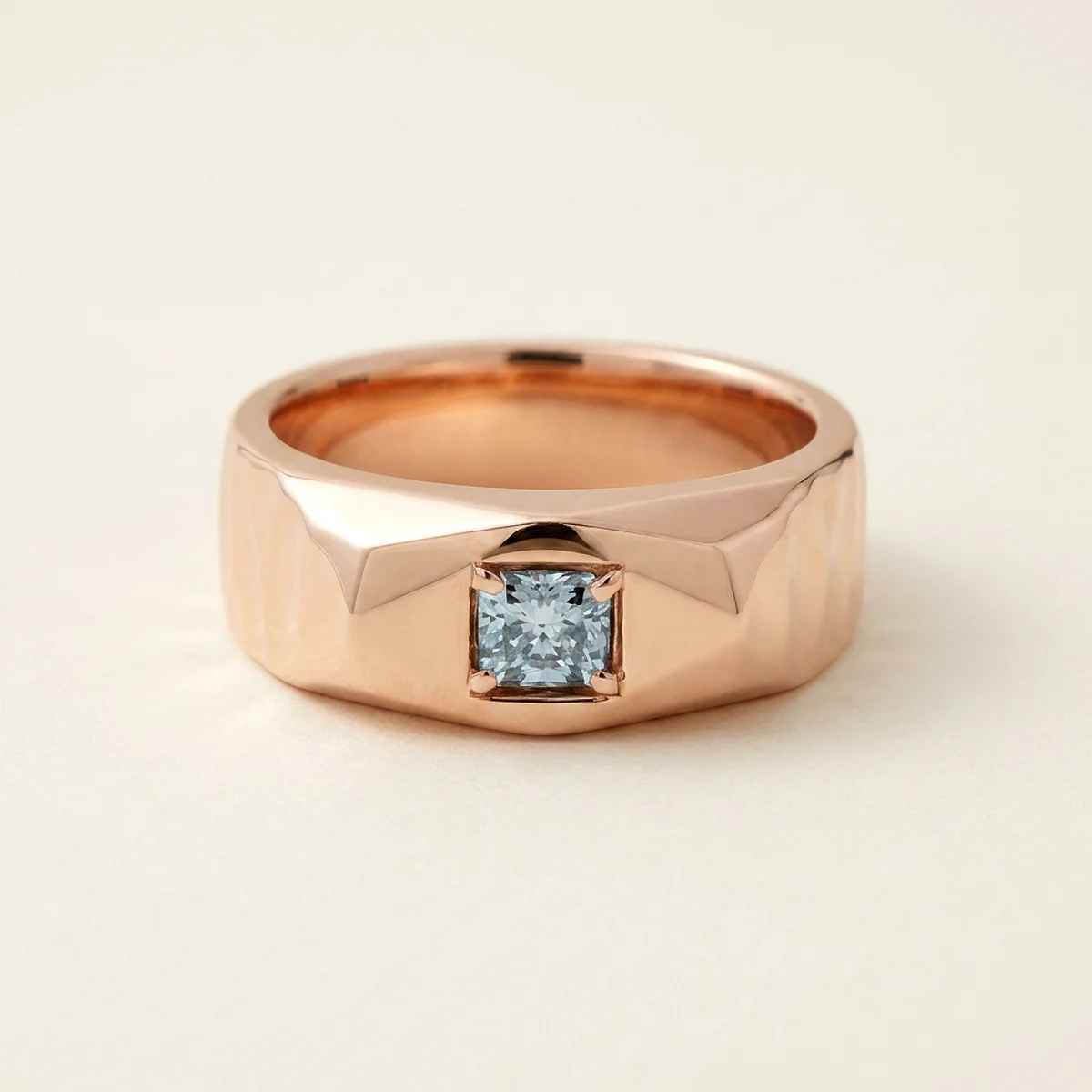A .25ct blue rectangular radiant diamond on a rose gold ring, custom-designed by Eterneva to honor the remarkable Amelia.
