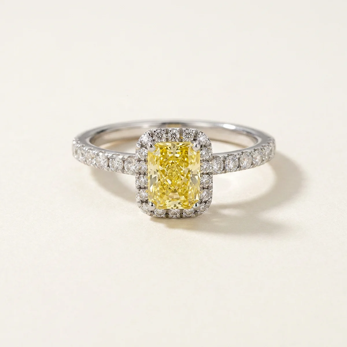 A .5ct yellow rectangular radiant diamond on a white gold ring, custom-designed by Eterneva to honor the remarkable Paul.