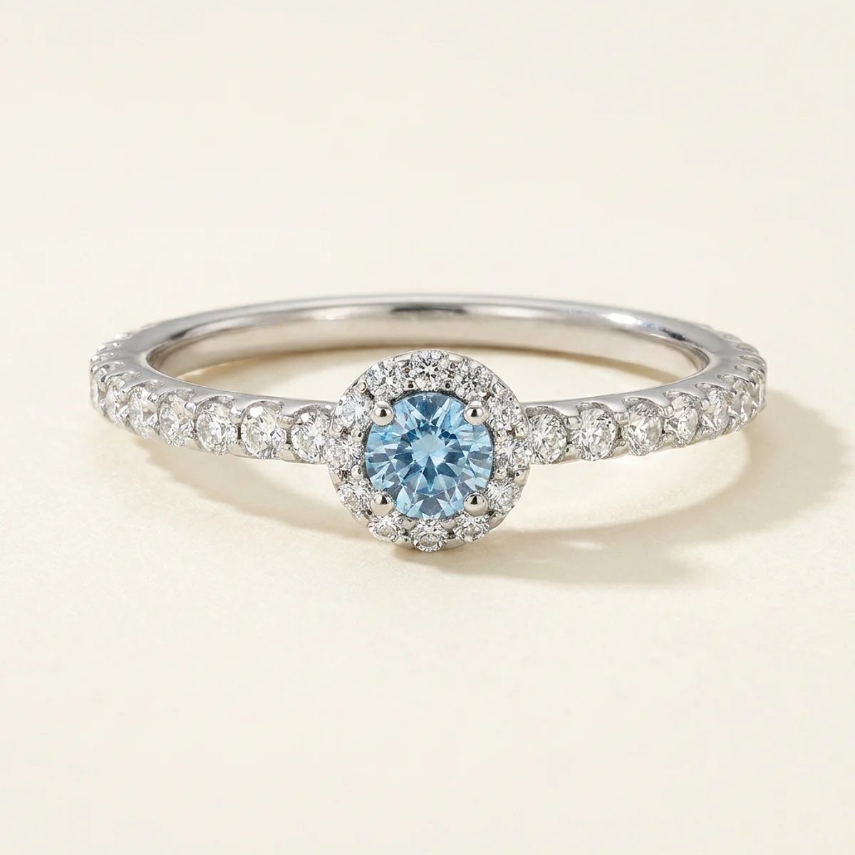 A .15ct blue round diamond on a white gold ring, custom-designed by Eterneva to honor the remarkable Janice.
