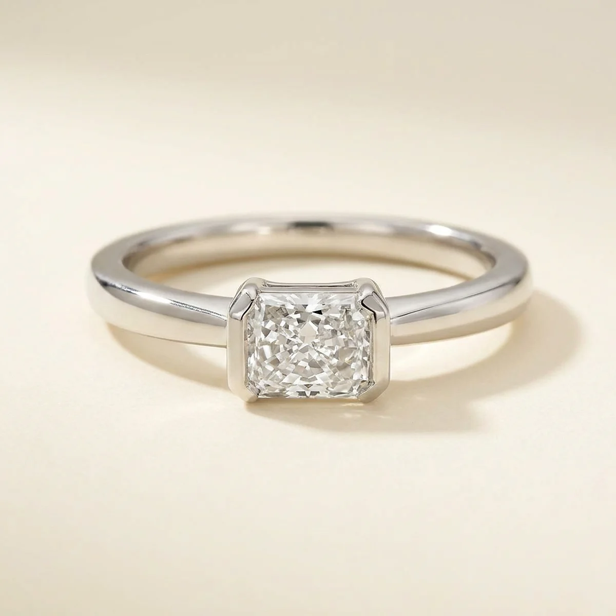 A .5ct colorless rectangular radiant diamond on a platinum ring, custom-designed by Eterneva to honor the remarkable Albus.
