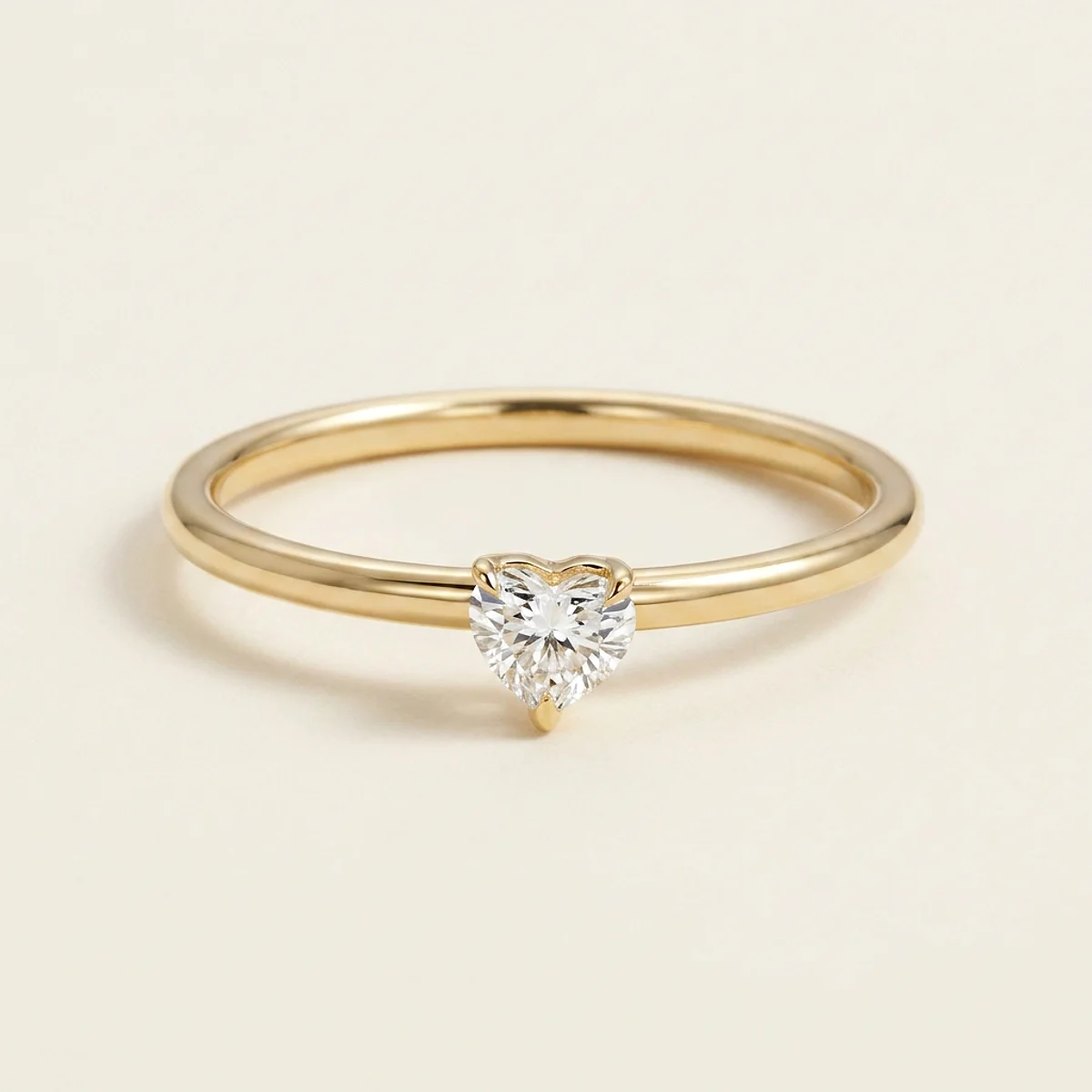 A .25ct colorless heart diamond on a yellow gold ring, custom-designed by Eterneva to honor the remarkable Chester.