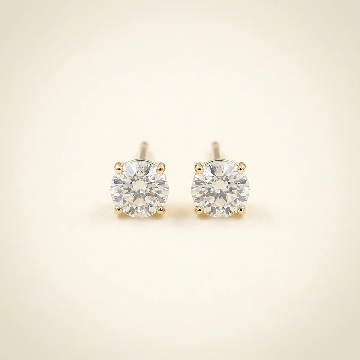 A .25ct colorless round diamond on yellow gold earrings, custom-designed by Eterneva to honor the remarkable Brent.