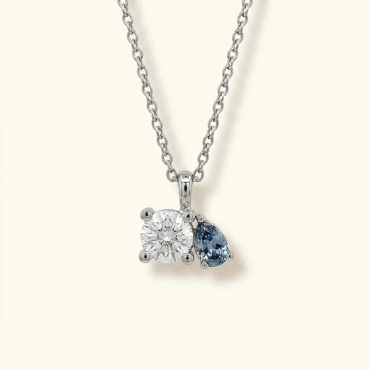 A .15ct blue pear diamond on a platinum necklace, custom-designed by Eterneva to honor the remarkable Boogers.