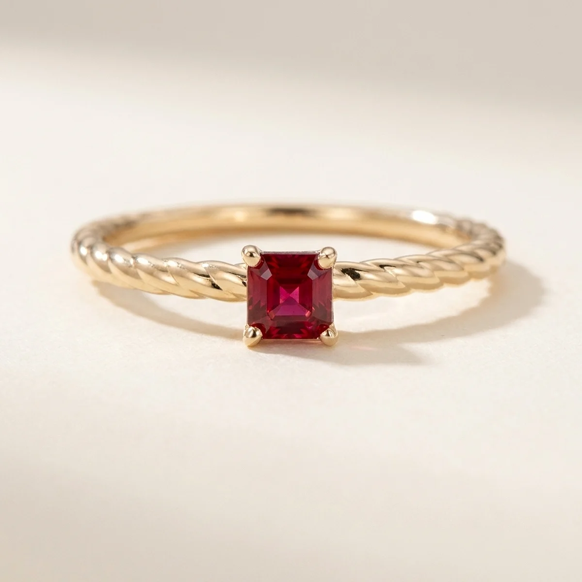 A .25ct pink asscher diamond on a yellow gold ring, custom-designed by Eterneva to honor the remarkable Barbara.