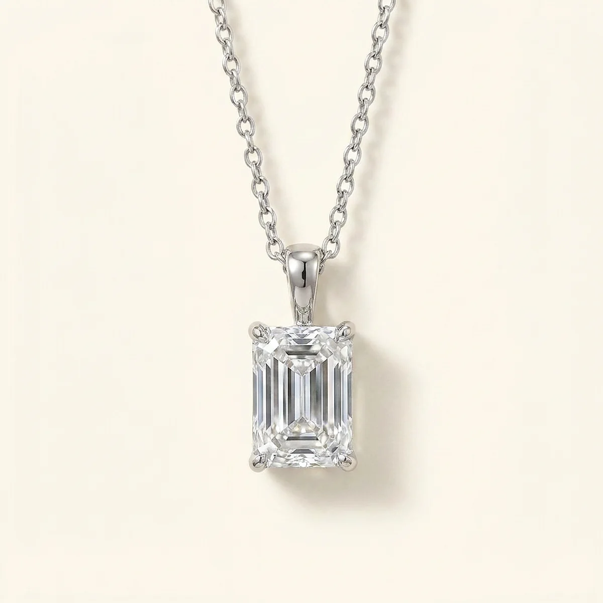 A 1ct colorless rectangular radiant diamond on a white gold necklace, custom-designed by Eterneva to honor the remarkable Kathleen.
