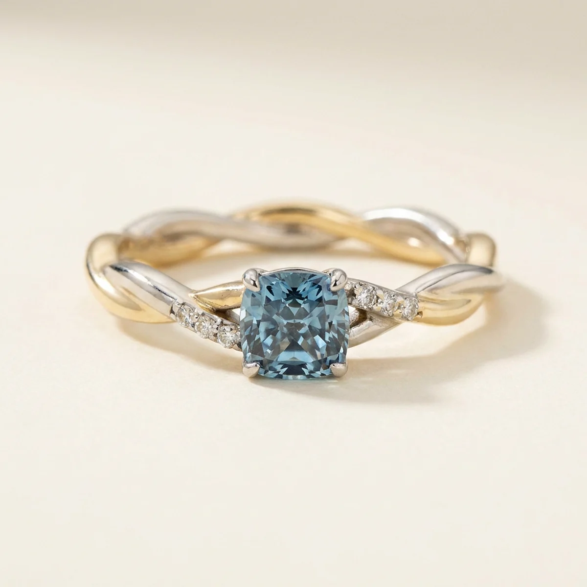 A .5ct blue cushion diamond on a mixed metal ring, custom-designed by Eterneva to honor the remarkable Patrick.