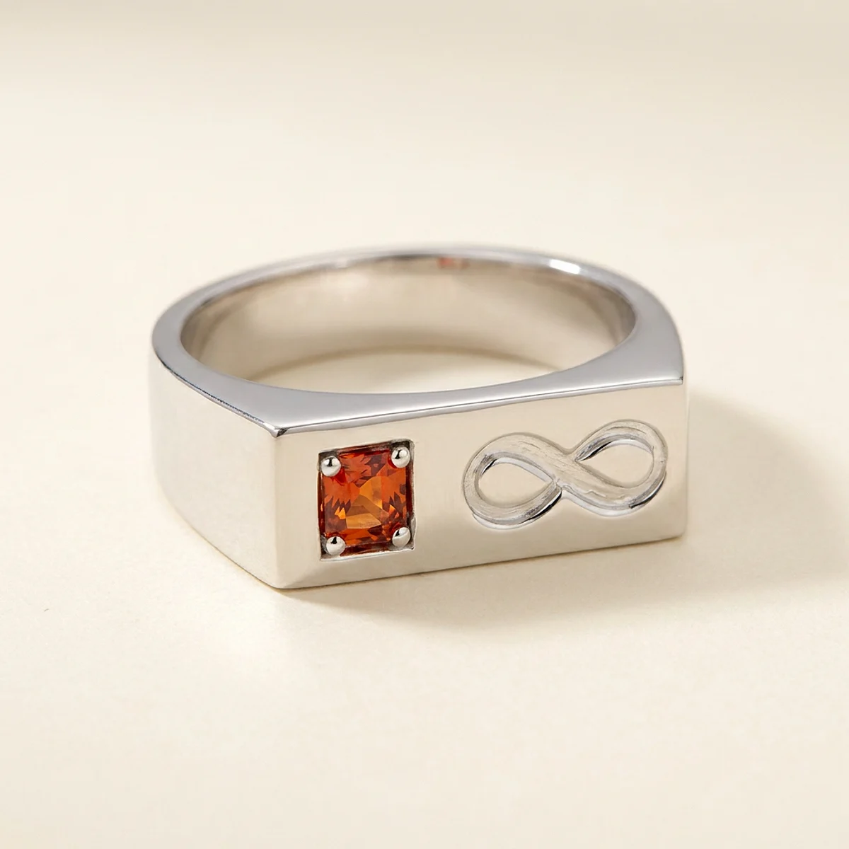 A .15ct red square radiant diamond on a white gold ring, custom-designed by Eterneva to honor the remarkable Gloria.