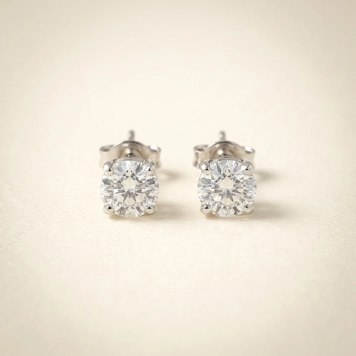 A .5ct colorless round diamond on white gold earrings, custom-designed by Eterneva to honor the remarkable Gloria.