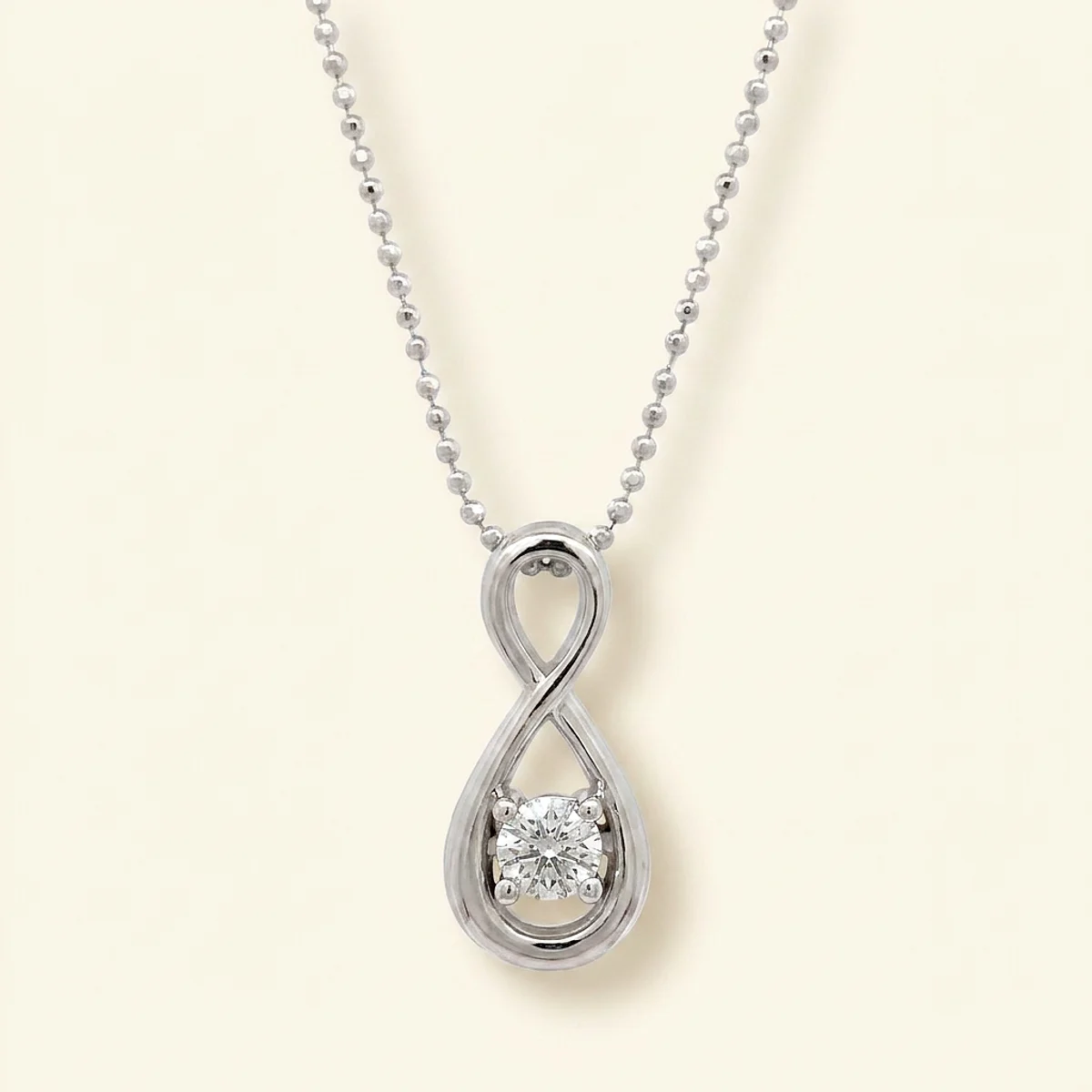 A .25ct colorless round diamond on a platinum pendant, custom-designed by Eterneva to honor the remarkable Aki.