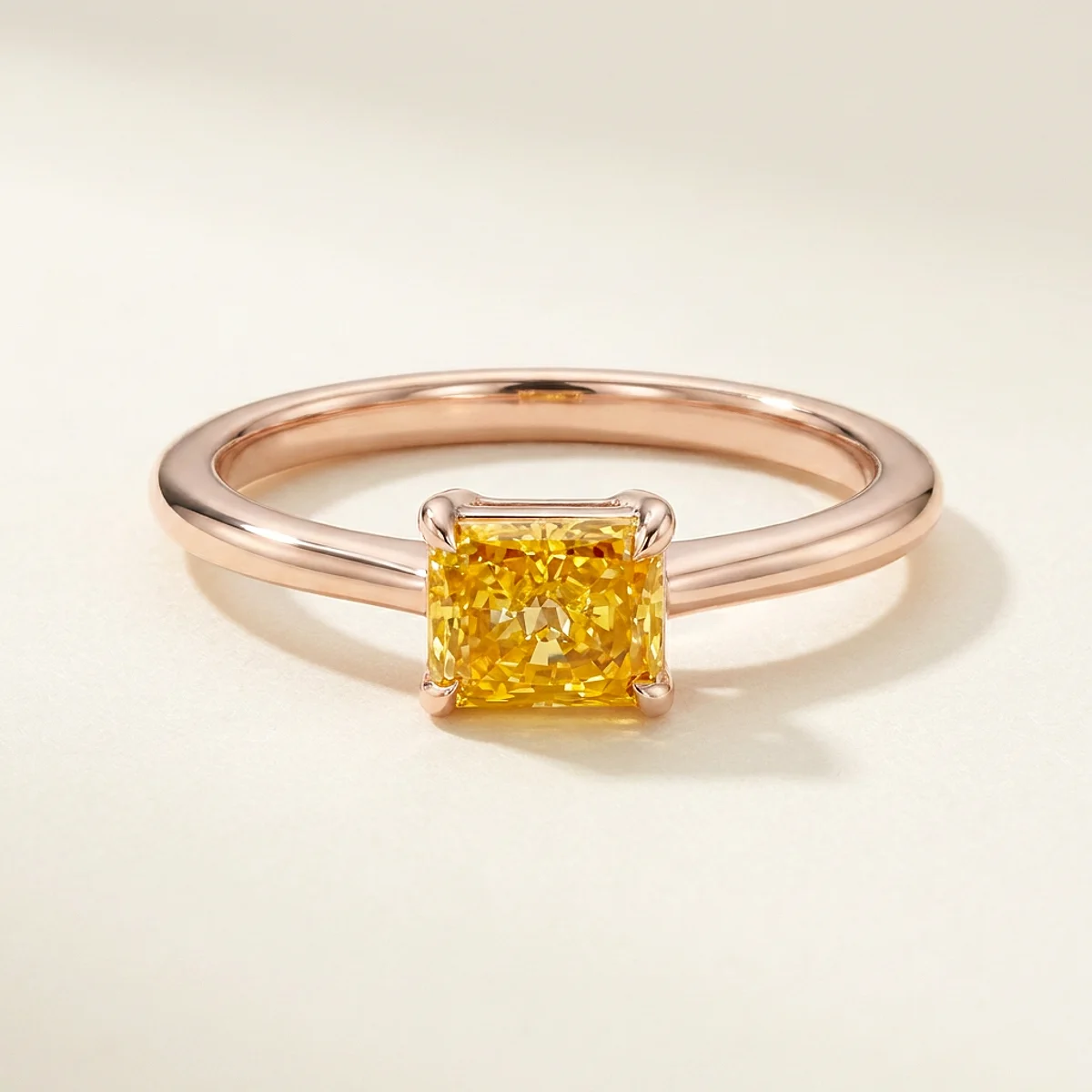 A .5ct yellow rectangular radiant diamond on a rose gold ring, custom-designed by Eterneva to honor the remarkable John.