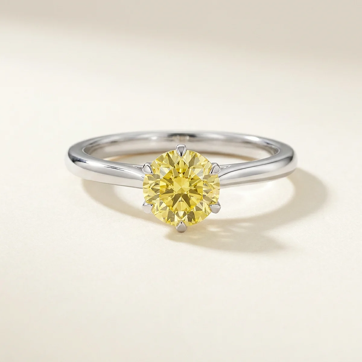A .75ct yellow round diamond on a white gold ring, custom-designed by Eterneva to honor the remarkable Lacy.