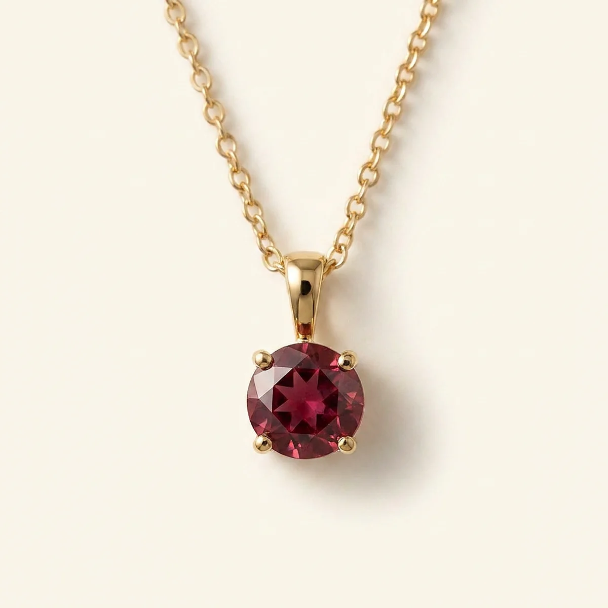 A .5ct red round diamond on a yellow gold necklace, custom-designed by Eterneva to honor the remarkable Dorothy.