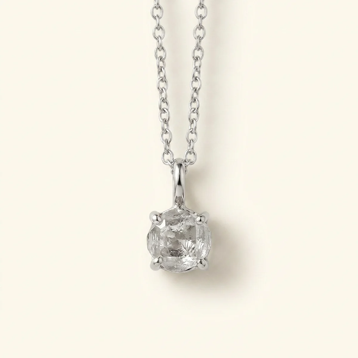 A 1ct colorless rough diamond on a white gold necklace, custom-designed by Eterneva to honor the remarkable Solomon.