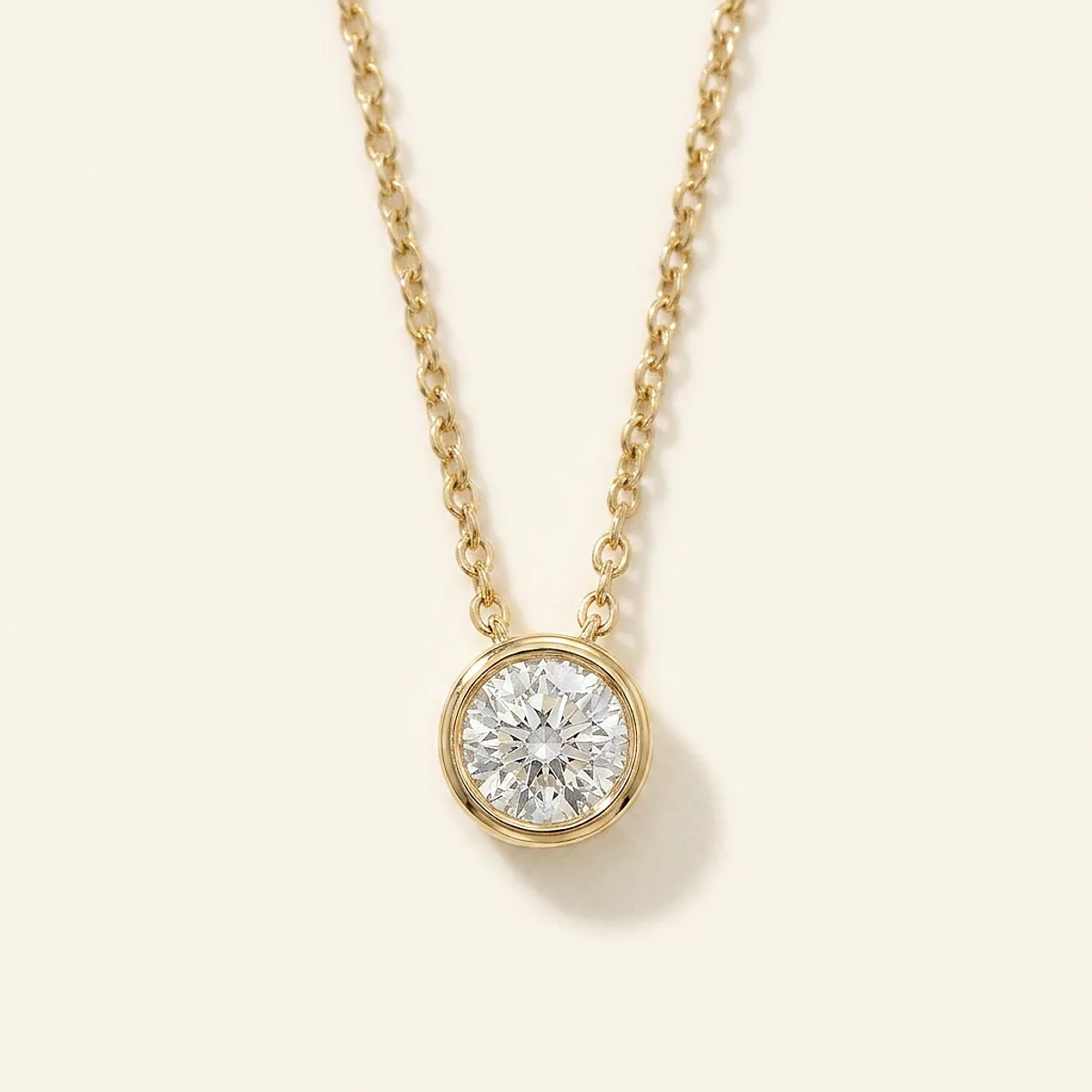 A .75ct colorless round diamond on a yellow gold necklace, custom-designed by Eterneva to honor the remarkable Erika.