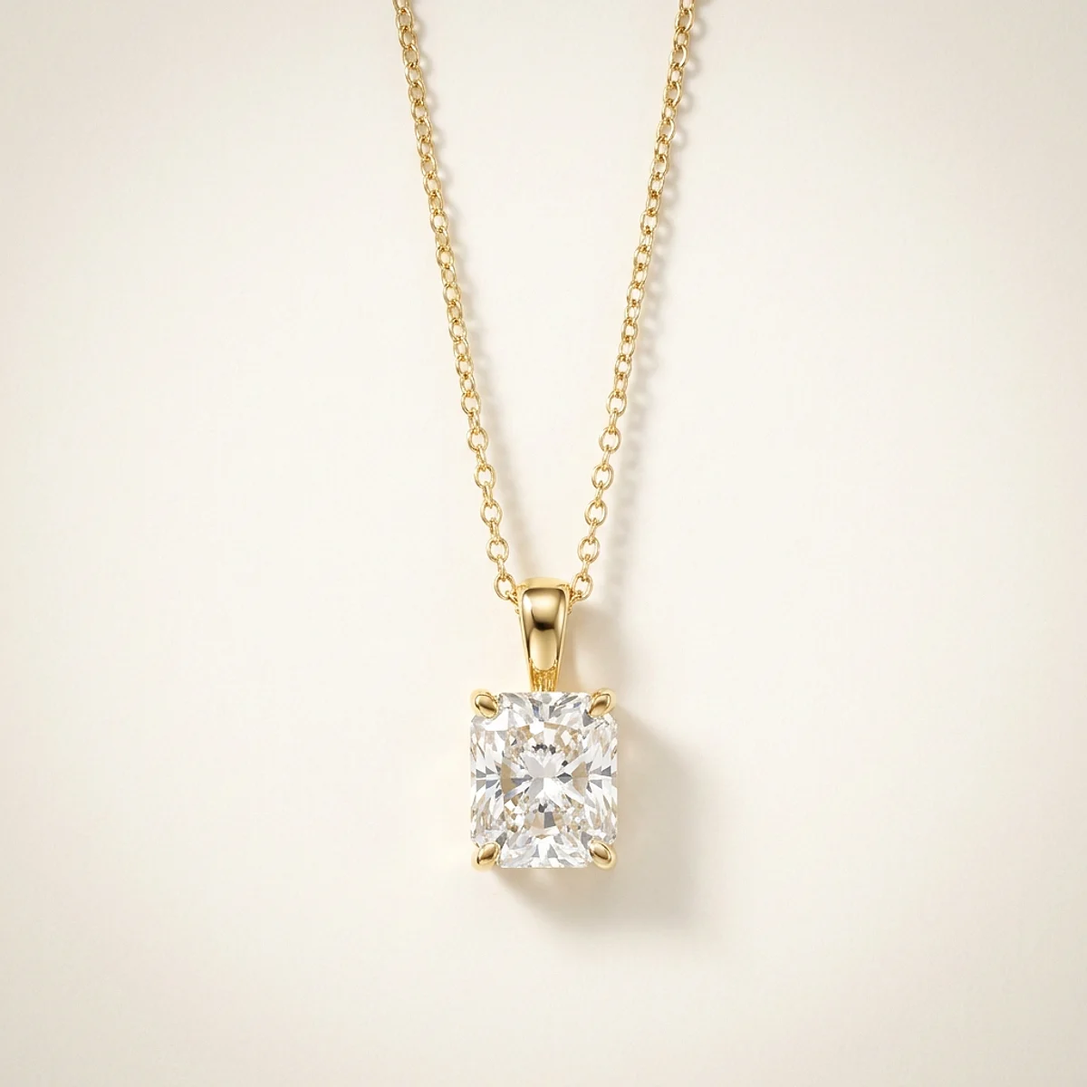 A 2ct colorless rectangular radiant diamond on a yellow gold necklace, custom-designed by Eterneva to honor the remarkable Lois.